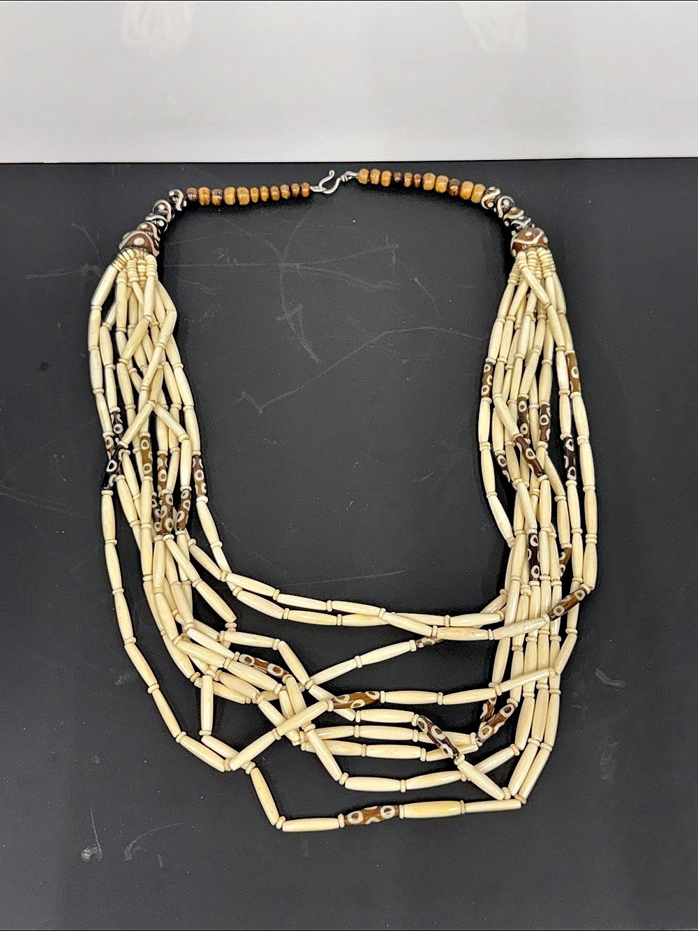 Handmade Kenyan / East African multi-strand cow-bone statement necklace with bat
